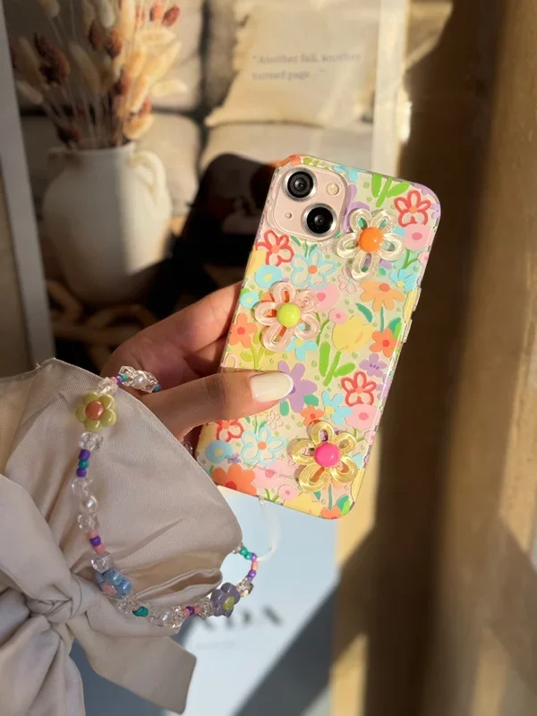 قاب گوشی آیفون باغچه با آویز و گل های برجسته