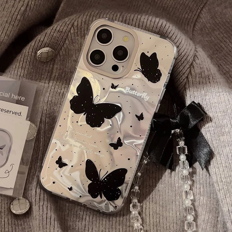 قاب گوشی آیفون black butterfly همراه با آویز پاپیون مشکی
