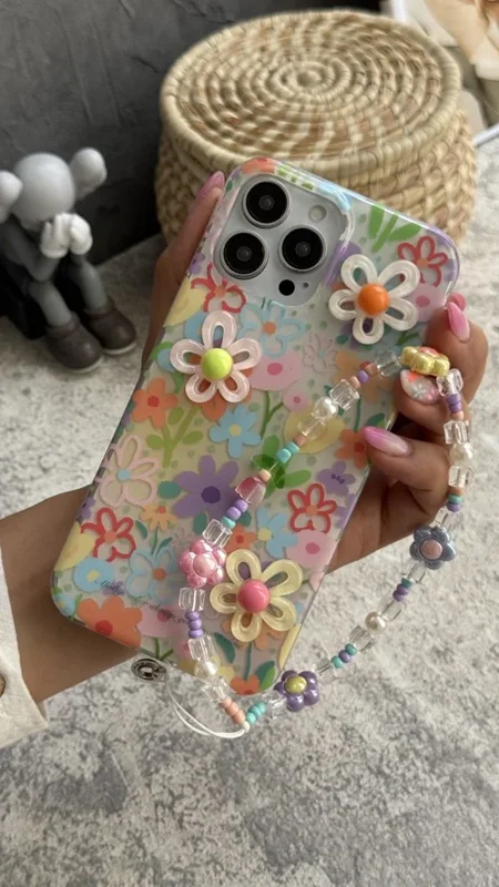 قاب موبایل آیفون گل بابونه رنگی رنگی برجسته + بندست